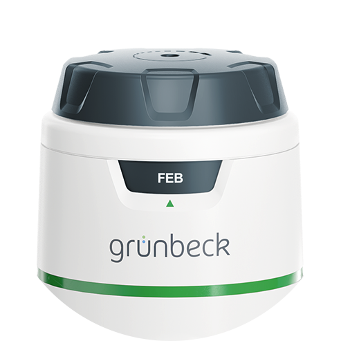 Ein zylinderförmiger Einstellungsrad von Grünbeck mit einem grünen Streifen und schwarzem Deckel zeigt das Wort "FEB" im oberen Bereich.